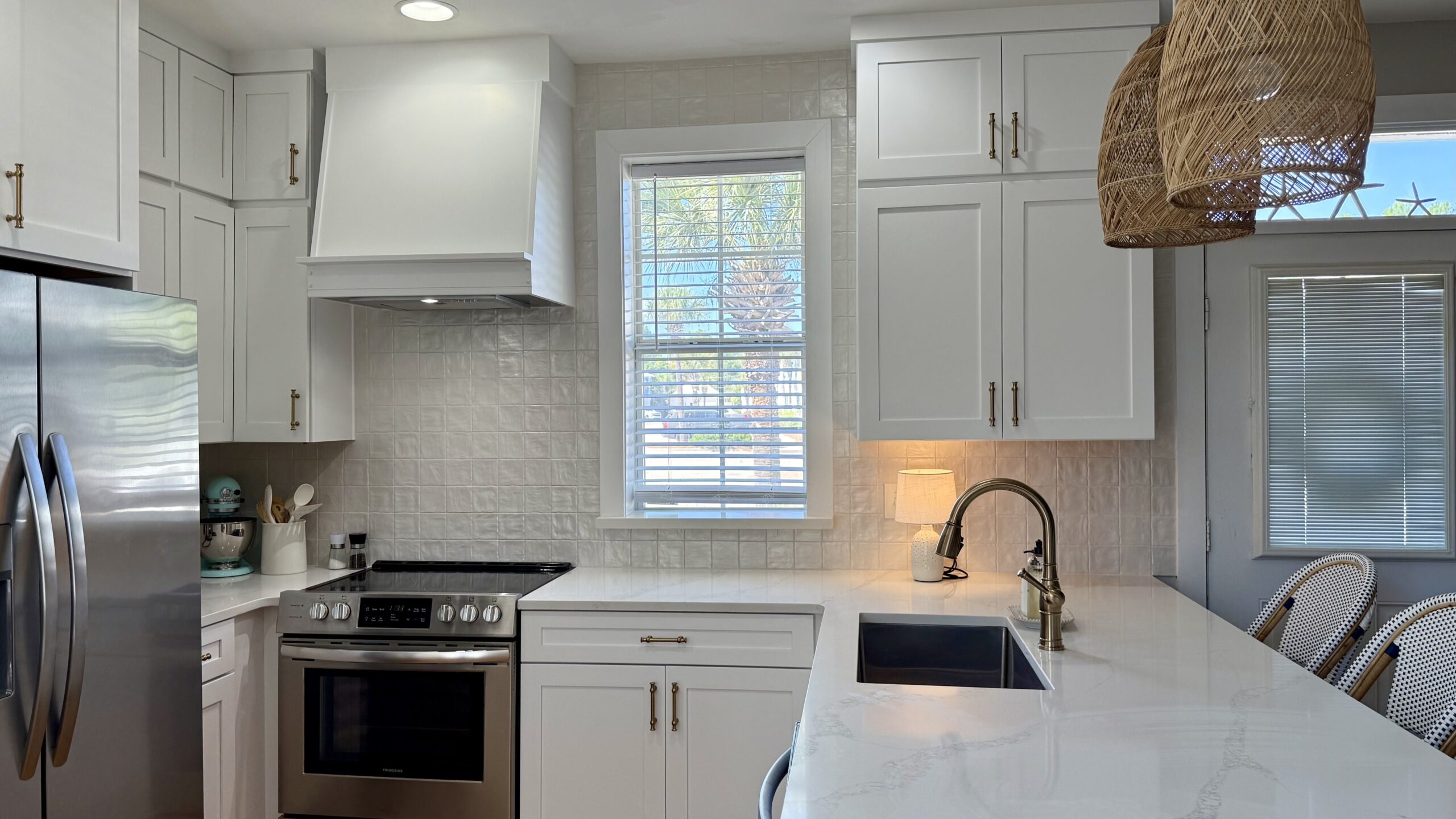 white kitchen cabinets at a rental home